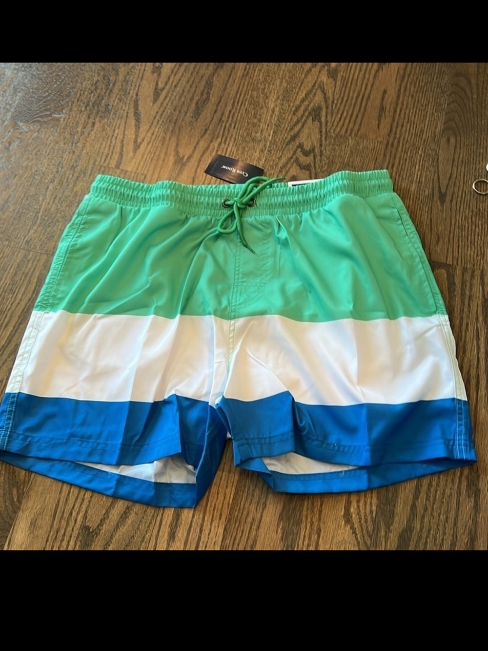 NWT mens Club Room swim trunks with mesh lining and draw string size large